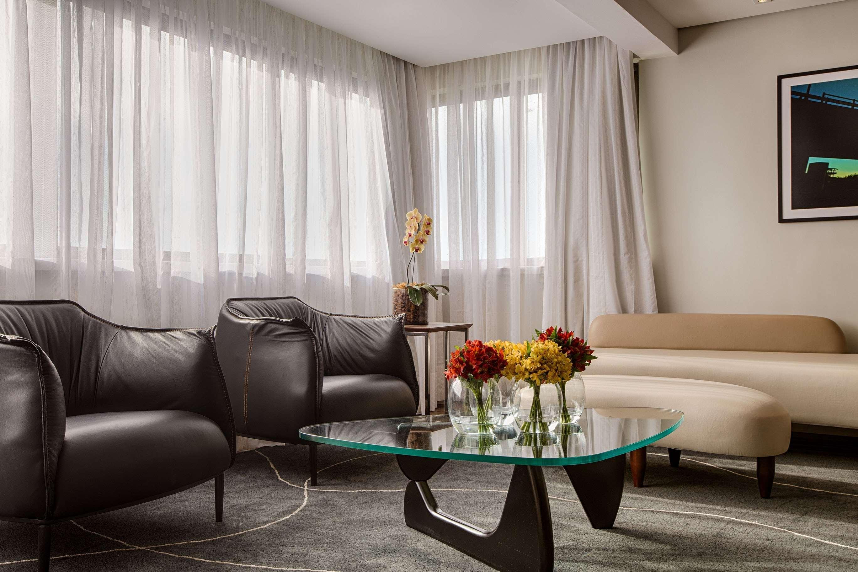 Art Hotel Transamerica Collection Порту-Алегри Экстерьер фото A living room at the hotel