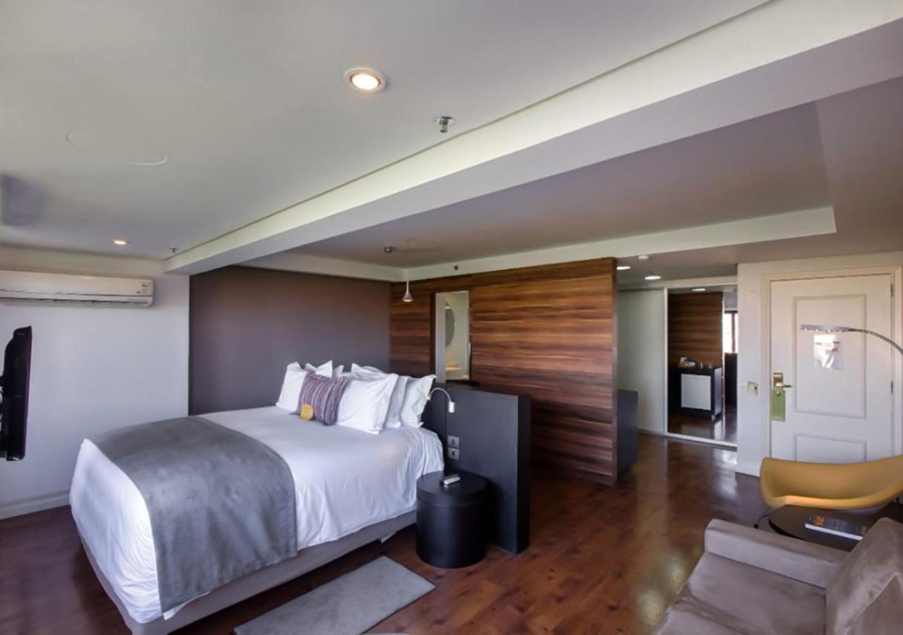 Art Hotel Transamerica Collection Порту-Алегри Экстерьер фото A bedroom at the hotel
